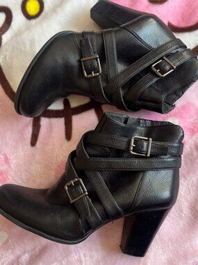 Black leather ankle boots with buckles
